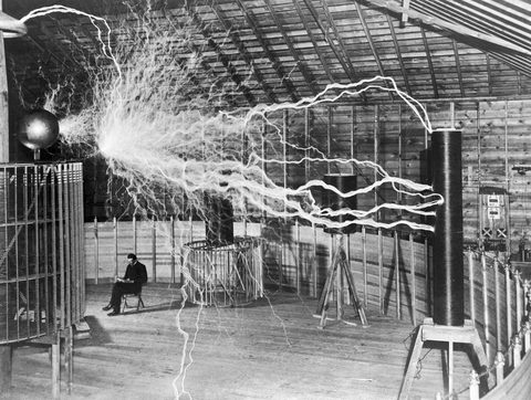 Nikola Tesla with His Equipment by Unknown photographer, framed print