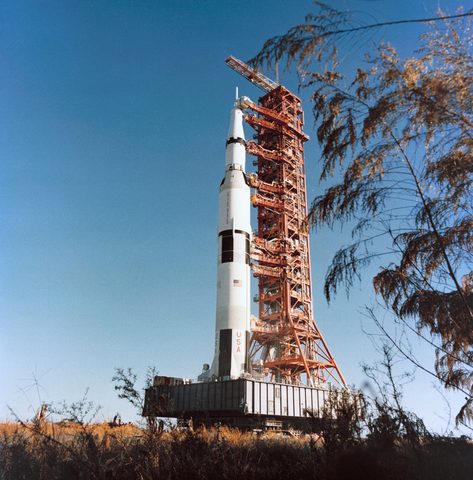 Apollo 16 Saturn V on the crawler under blue sky by NASA, 1972, framed print