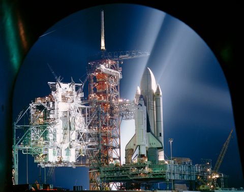 Columbia on the pad under night floodlights by NASA, 1981, framed print