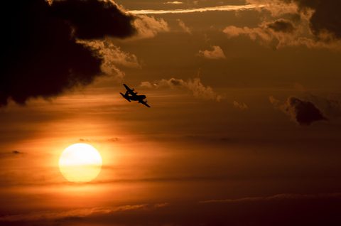 C-130 at sunset by USAF, framed print