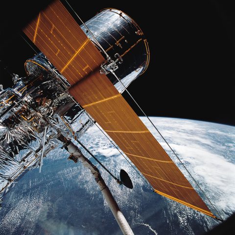 Hubble Space Telescope over Earth with arrays deployed by NASA, 1990, framed print