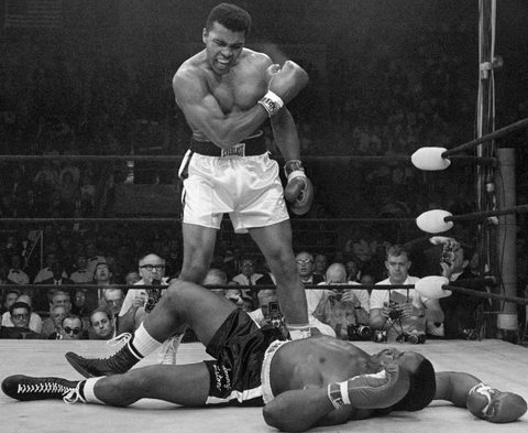 Muhammad Ali Standing over Sonny Liston by John Rooney (Associated Press), 1965, framed print