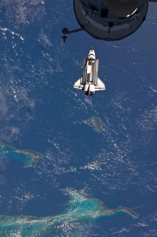 Atlantis over the Bahamas on approach to the ISS by NASA / Expedition 28 crew, 2011, framed print