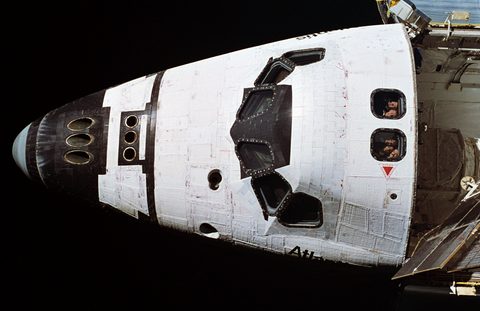 Atlantis crew looking out overhead windows toward Mir by NASA / STS-74 crew, 1995, framed print