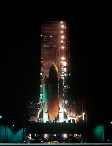 Challenger STS-8 stack inside the VAB at night by NASA, 1983, framed print